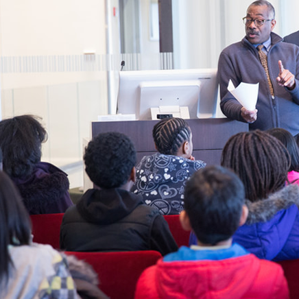 Ancil George, Community Outreach Librarian, introduces Lea School students to the Kislak Center