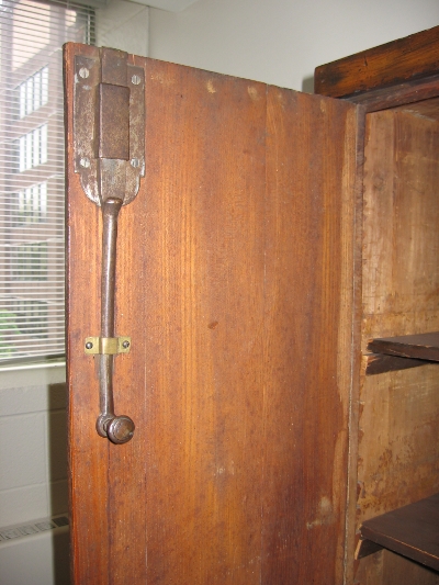 Latch at the top of the right door