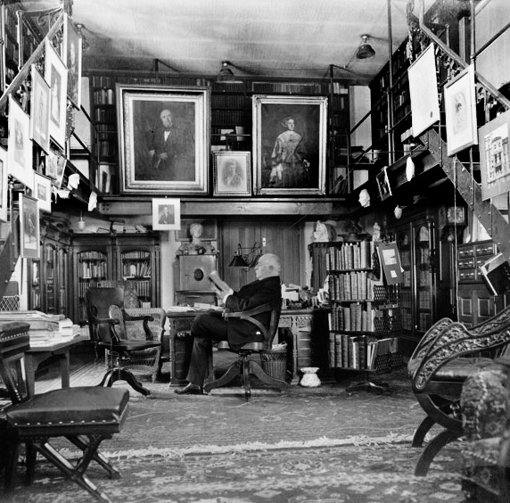Photograph of Horace Howard Furness in the library of his summer home, Lindenshade