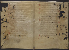 12th-century vellum bifolium containing portions of Psalms 79, 80, and 84, with initials in red. The text's legibility has been affected by fading and worm damage (UPenn Ms. Coll. 591, Folder 1).