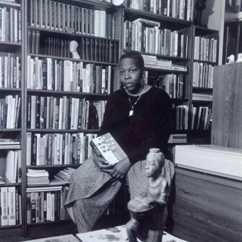 Banks seated in front of her collection, ca. 1990s (photograph by Harold Darwin, Anacostia Community Museum)