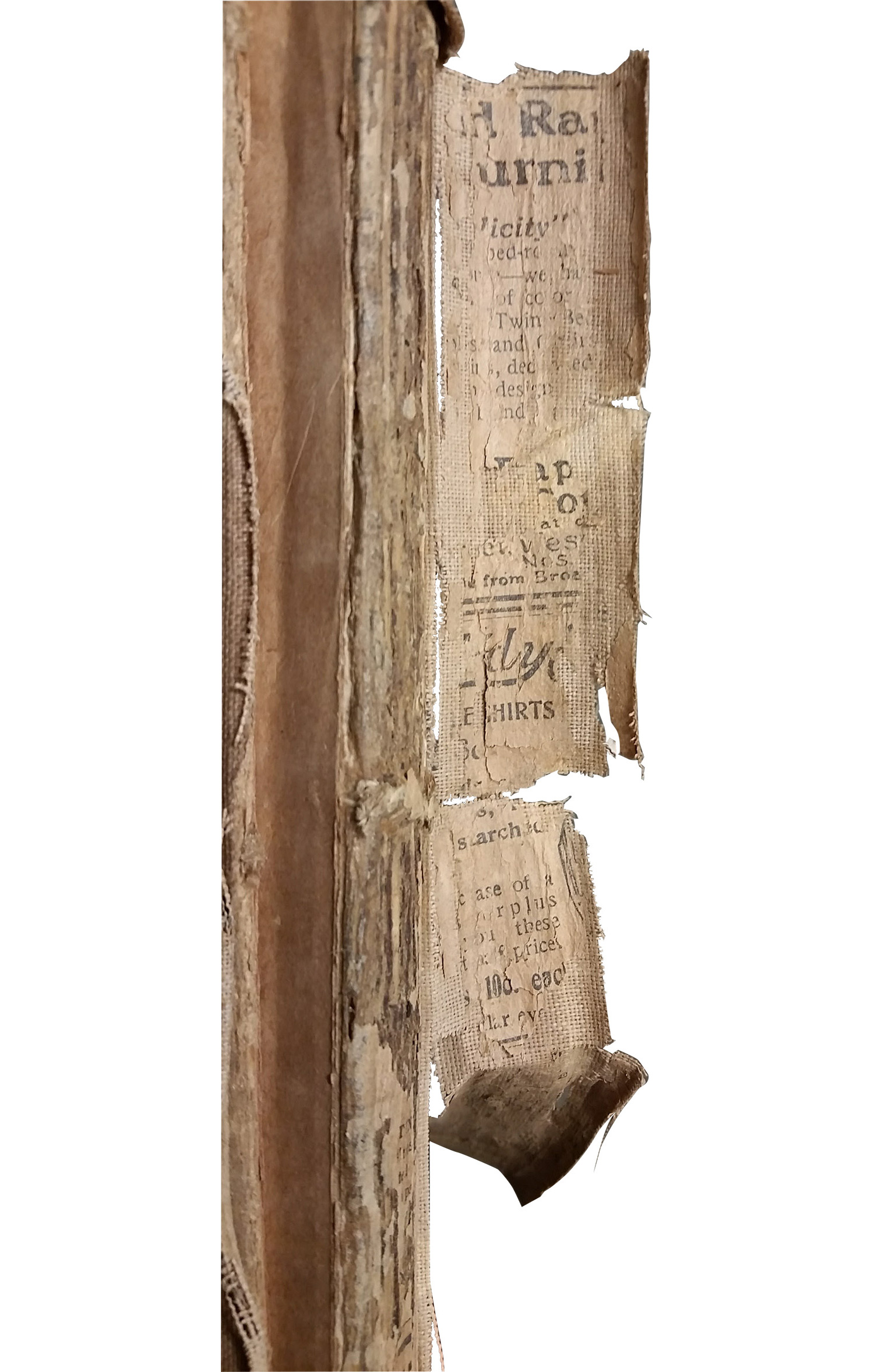 scan of the fragile and decayed binding of the book, some text visible but unreadable