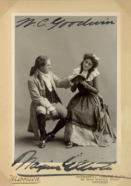 black and white photograph of Nat C. Goodwin and Maxine Eliot in period costume enacting a scene from a play, photo is autogaphed