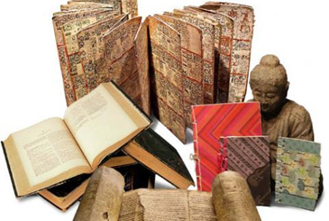 Collection of material texts, including a statue