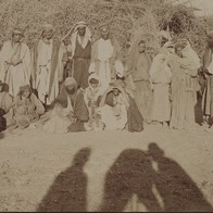 Bedouins showing the shadow of the photographer