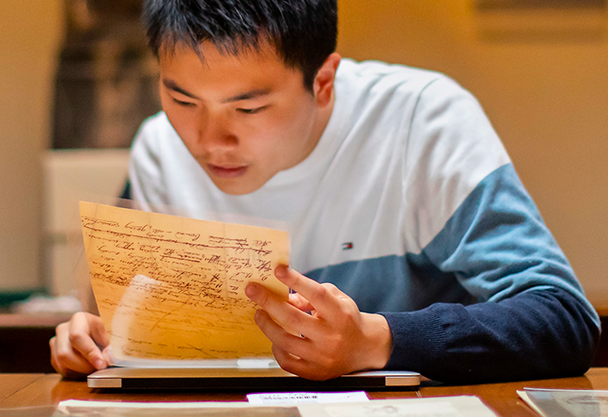 Student studying the Walt Whitman Papers in UPenn's Kislak Center