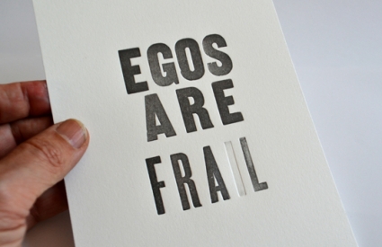 Print with text "egos are frail"