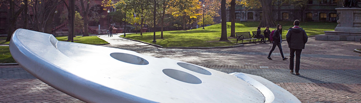 Split Button by Claes Oldenburg in front of Van Pelt-Dietrich Library Center, looking toward Fisher Fine Arts Library on the left and the Boyle statue of Franklin on the right