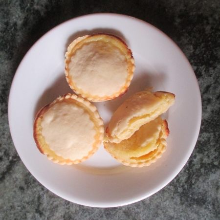 Photo of three almond puddings on plate