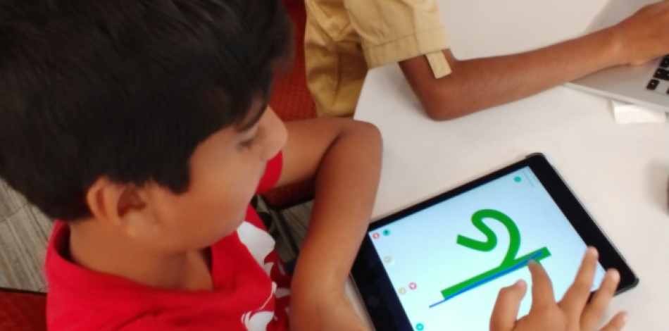 Child using Bangla language software