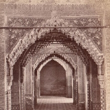 Sepia photo showing an aisle of Alhambra