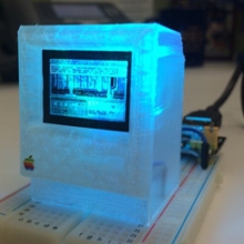 3D-printed Arduino-powered replica of a Macintosh computer running a graphical adventure game based on William Gibson's novel Neuromancer. Model by DB Bauer, University of Maryland. Used with permission