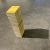 Zoe Leonard's sculpture, a stack of 27 books