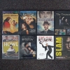 A selection of featured DVDs shows the films Cyrano de Bergerac, Sylvia, Neruda, The Treasure, Howl, Paterson, Roxanne, and Slam.