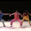 Four dancers holding hands 