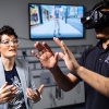 Marion Leary with student in VR headset